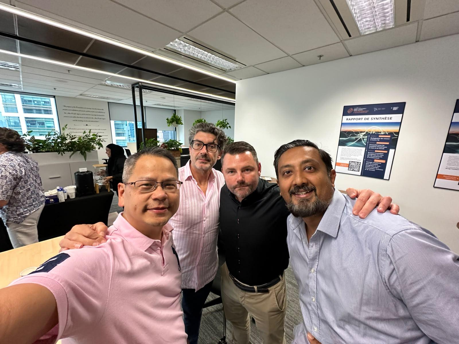 Four members of the first AI Upgrade cohort between sessions