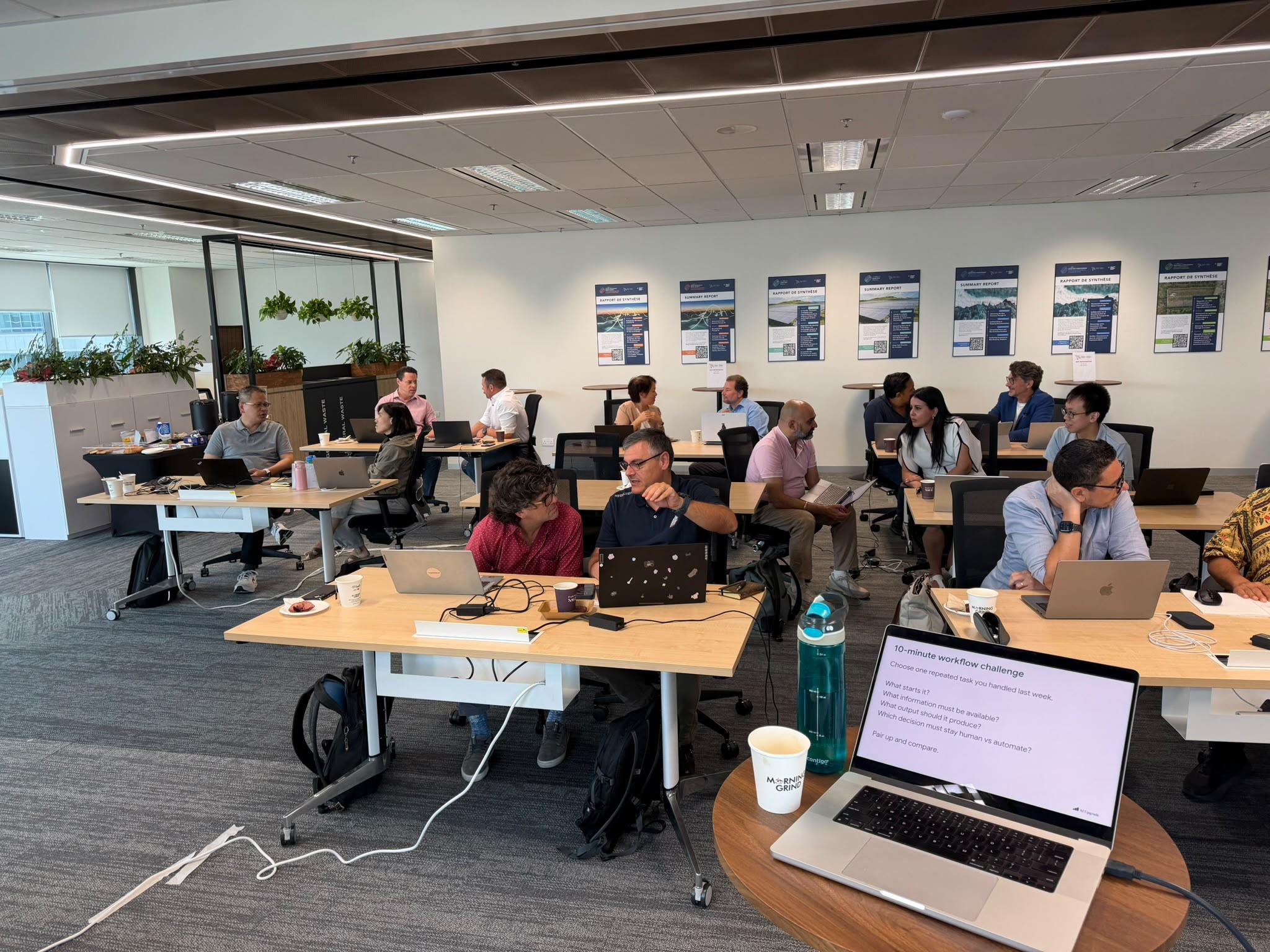 Pairs mapping a repeated work task during the first AI Upgrade workshop
