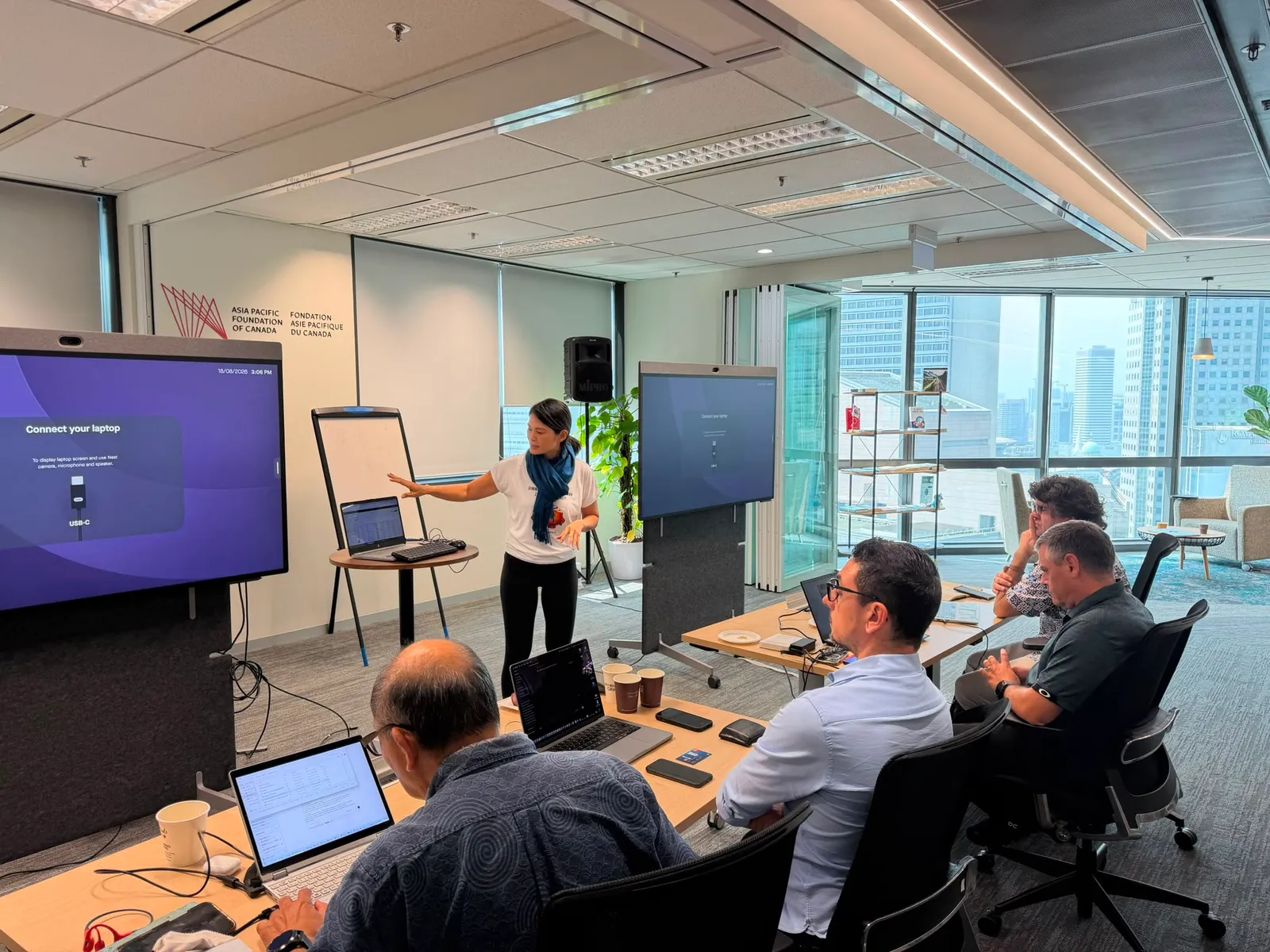 An AI Upgrade participant presenting the work she built at the August Singapore workshop