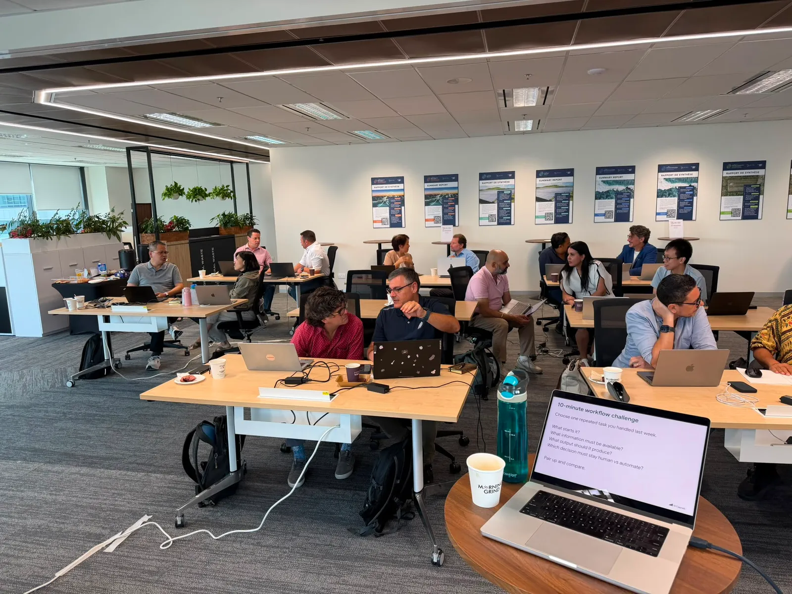 Participants working together at the first AI Upgrade workshop in Singapore